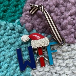 Henri bendel why the frown Christmas ornament